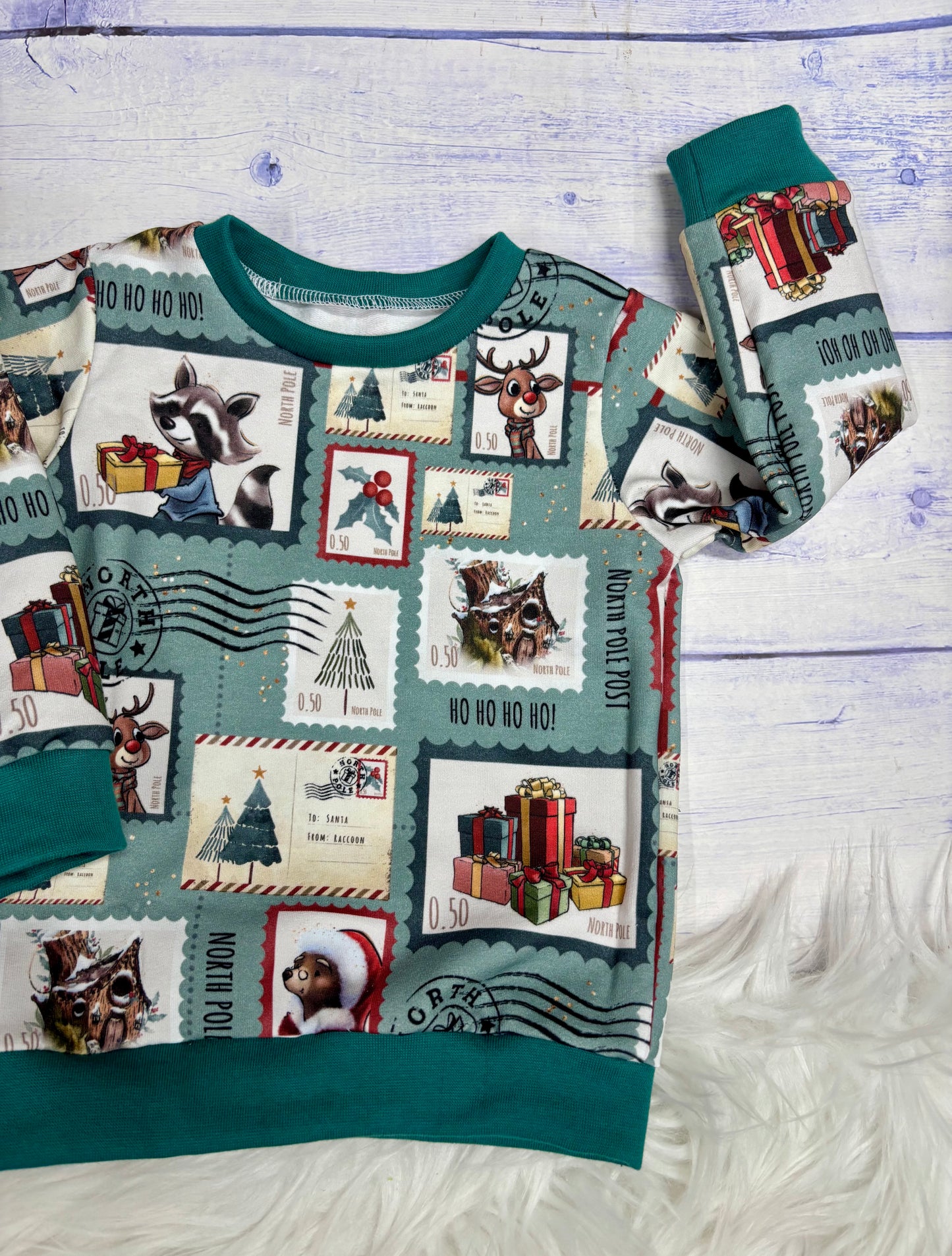 BABYSWEATER Weihnachtspost Mint Gr.80