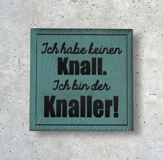 Kunstlederlabel ICH HABE KEINEN KNALL, ICH BIN DER KNALLER